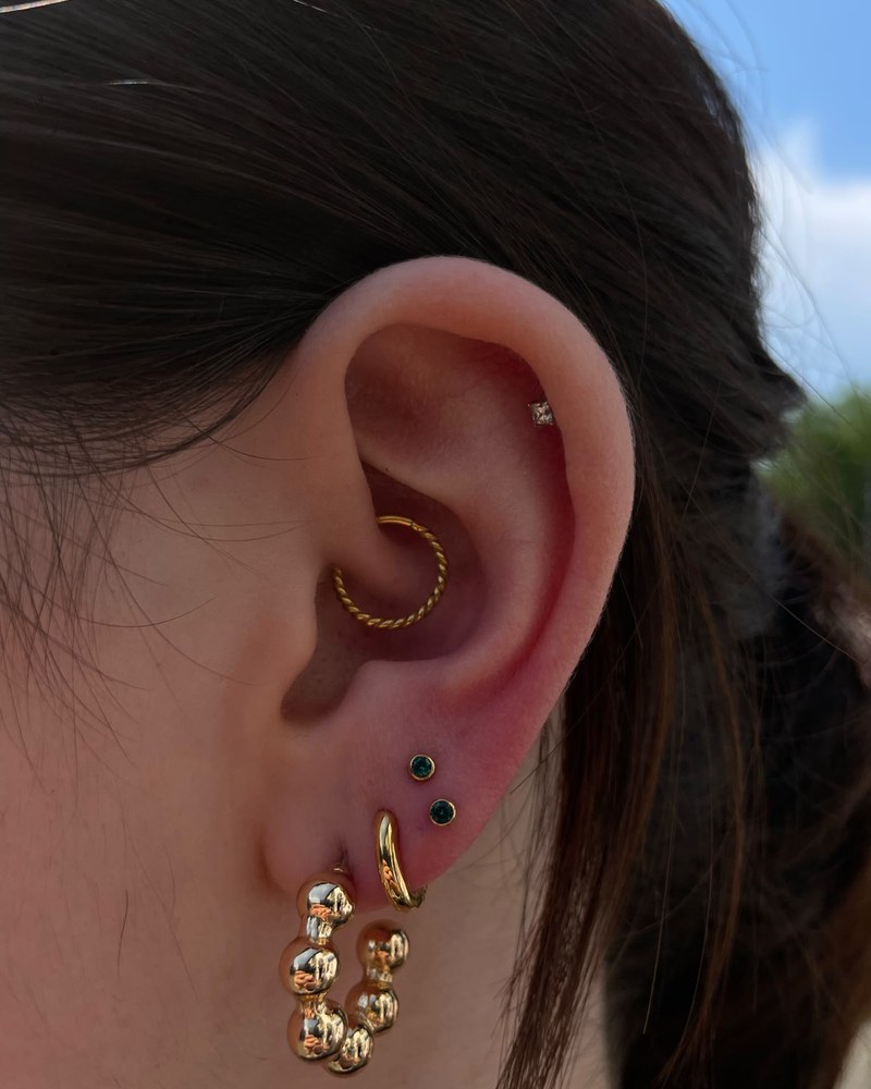 Piercing jewellery and ear styling, photograph 2